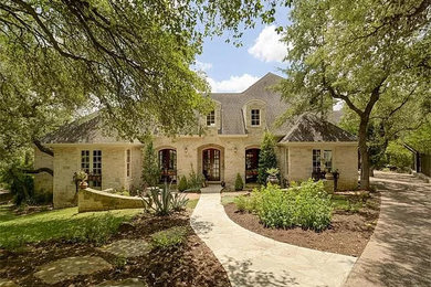 French country home design photo in Austin