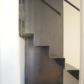 Scala in ferro grezzo verso sottotetto