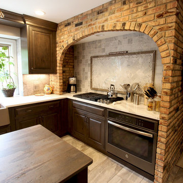 Rustic Alder Cabinets with Apron Front Farm Sink and Dekton Trillum Island