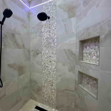 Curd-less walk-in shower; heated floors in bathroom + shower+bench LED