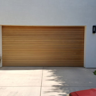 Design ideas for a medium sized modern attached double garage in Los Angeles.