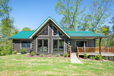 Example of a country exterior home design in Other