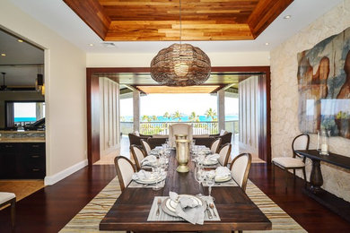 This is an example of a large modern dining room in Hawaii.