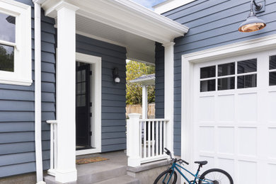 Inspiration for a large timeless detached two-car garage remodel in Portland