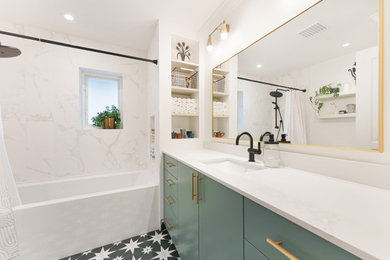 Example of a mid-sized arts and crafts kids' white tile and ceramic tile ceramic tile, black floor, single-sink and wood wall bathroom design in Vancouver with flat-panel cabinets, green cabinets, a two-piece toilet, white walls, an undermount sink, quartz countertops, white countertops, a niche and a built-in vanity