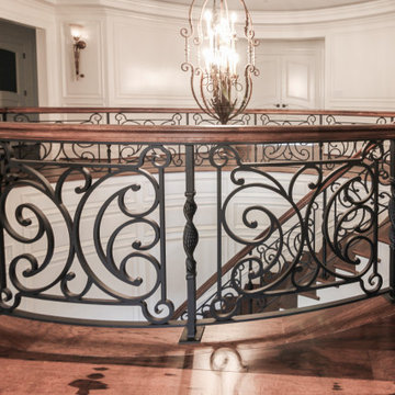 Project #74 | Circular Staircase with Hand-Forged Metal Panels