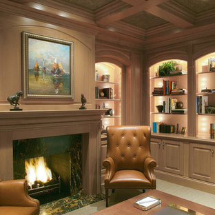 Photo of a large mediterranean enclosed living room in Chicago with a reading nook, carpet, a standard fireplace, a wooden fireplace surround and no tv.