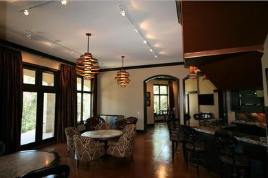 Minimalist kitchen/dining room combo photo in Oklahoma City with beige walls