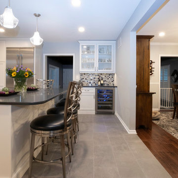 Transitional White & Gray Kitchen Remodel | Quartz Island & Mosaic Backsplash