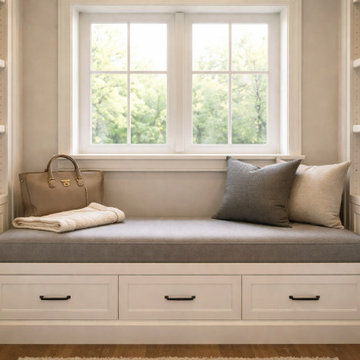 Custom Walk-In Closet with Window Bench Seating and Shoe Storage Cabinets