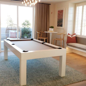 Modern pool table for staging in a beachfront model home