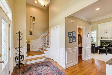 Inspiration for a transitional entryway remodel in Milwaukee