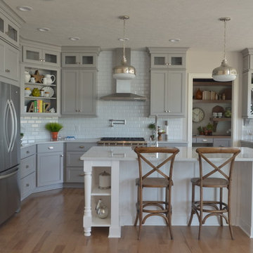 Spacious Gray Kitchen with Stacked Cabinets
