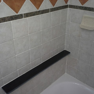 Master and main bathroom with imported Italian porcelin and granite tiles.