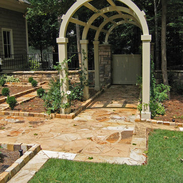 Cypress Barrel Arbor and gate, Fieldstone columns, knee-wall walkway and edging