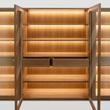 Modern solid oak bookshelf with an asymmetric design