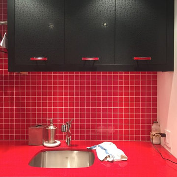 Red glass tile kitchen backsplash