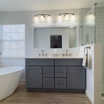 Spacious Bathroom with Dual Vanity and Freestanding Tub