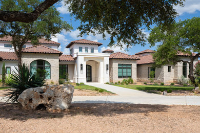 Inspiration for a mediterranean exterior home remodel in Austin