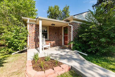 Transitional home design photo in Denver
