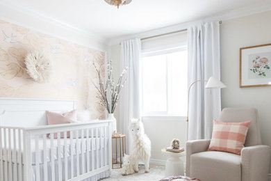 This is an example of a mid-sized traditional nursery for girls in Ottawa.