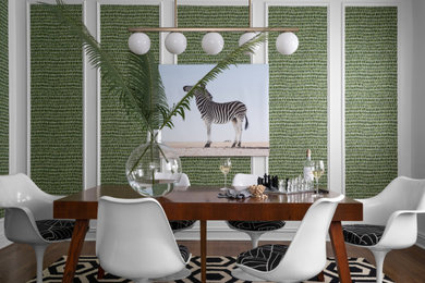 Dining room - transitional dark wood floor, brown floor, wall paneling and wallpaper dining room idea in Atlanta with green walls