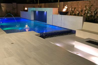 Inspiration for a modern pool remodel in Orange County