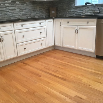 Cherry cabinets finished in Simply White
