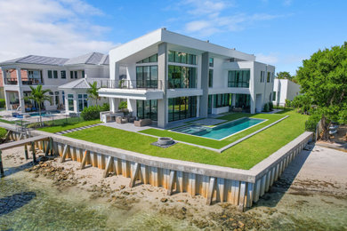 Example of a trendy home design design in Miami