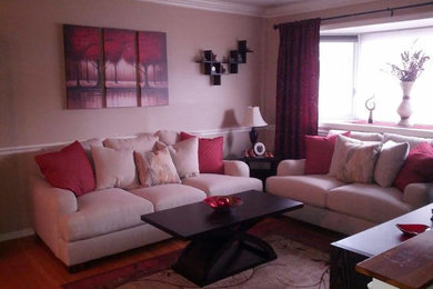 Mid-sized transitional formal and enclosed medium tone wood floor and brown floor living room photo in Baltimore with beige walls, no fireplace and no tv