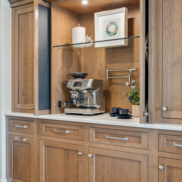 Built-In Coffee Bar with Slide-Away Doors and Custom Cabinetry