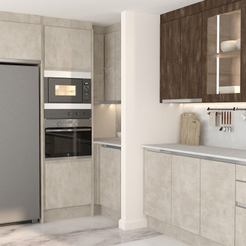 Modern Handleless Kitchen Raw Steel with Breakfast Area by Inspired Elements