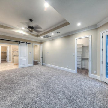 Master Suite with His and Her walk in closets