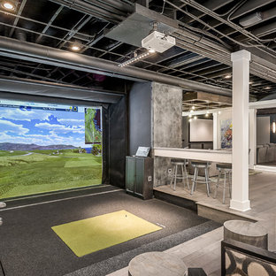 Medium sized contemporary indoor sports court in Chicago with grey walls, grey floors and carpet.