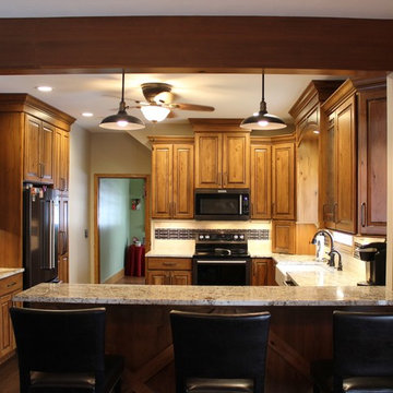 Rural Kewanee Kitchen Remodel With Rustic Beech Cabinets and White Sand Granite