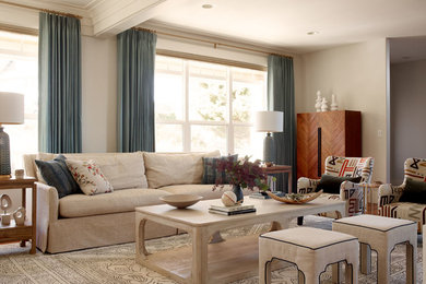 Example of a large transitional enclosed and formal medium tone wood floor and brown floor living room design in Seattle with white walls, no fireplace and no tv