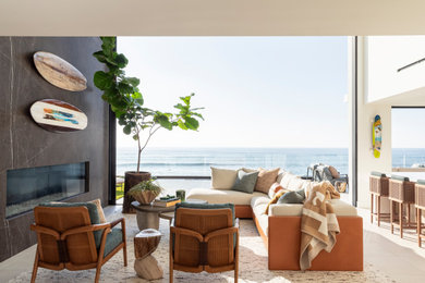 Living room - transitional formal and open concept vaulted ceiling and white floor living room idea in San Diego with a ribbon fireplace, a stone fireplace and white walls