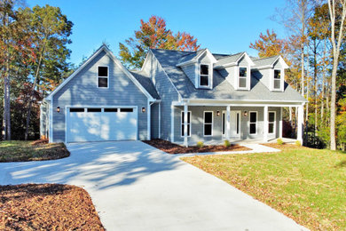 Example of a country exterior home design in Charlotte