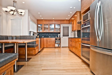Example of a trendy galley kitchen design in Seattle with shaker cabinets and no island