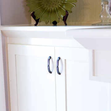 Fireplace flanked with Bookshelves