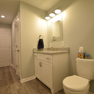 Subway Tile/ Faux Wood Plank Bath
