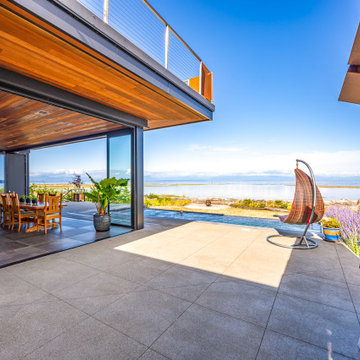 Oceanfront Home Captures Nature’s Drama with NanaWall Stacking Glass Doors