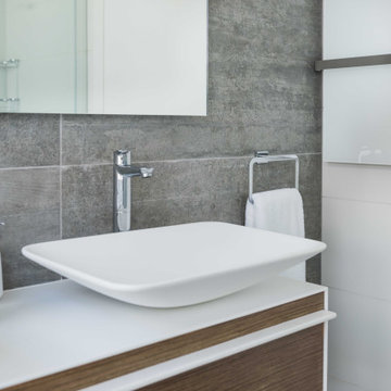Guest bathroom with wood vanity