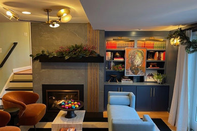 Mid-sized open concept light wood floor living room photo in DC Metro with blue walls and a tile fireplace