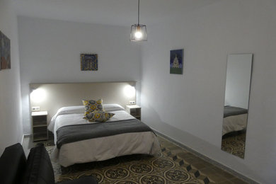 Cottage bedroom photo in Other