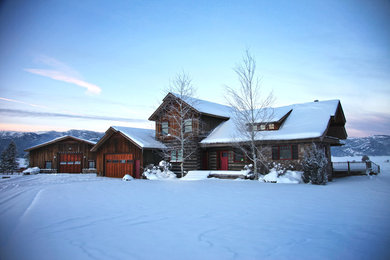 Inspiration for a rustic green wood exterior home remodel in Other