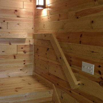 Knotty pine paneling staircase landing