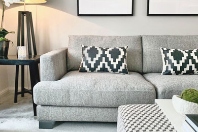 This is an example of a medium sized contemporary living room in Essex.