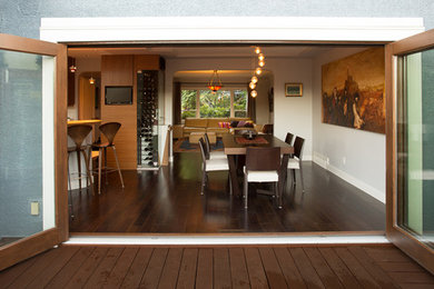 Small trendy dark wood floor great room photo in Vancouver with gray walls