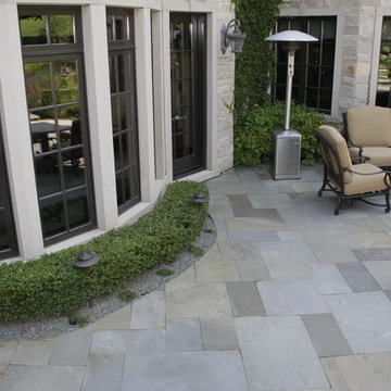 Full Landscape with Patio, Outdoor Kitchen, Stone Driveway and Planting